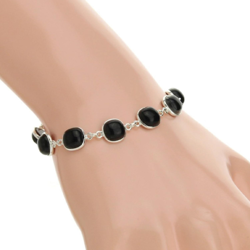 Polsera Artesanal de Plata 925 amb Ònix – Elegància i Protecció